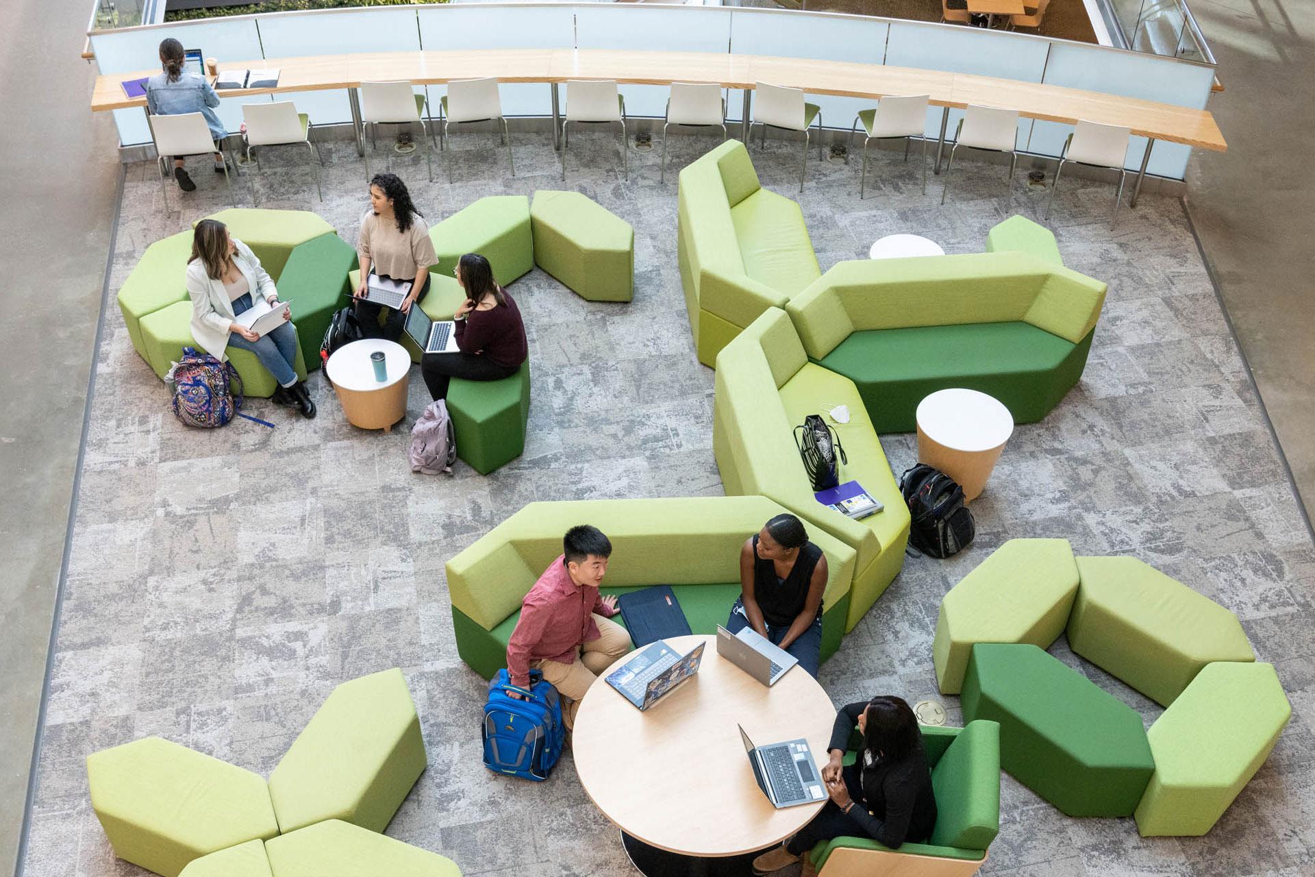 Students in Study Area with Green Couches